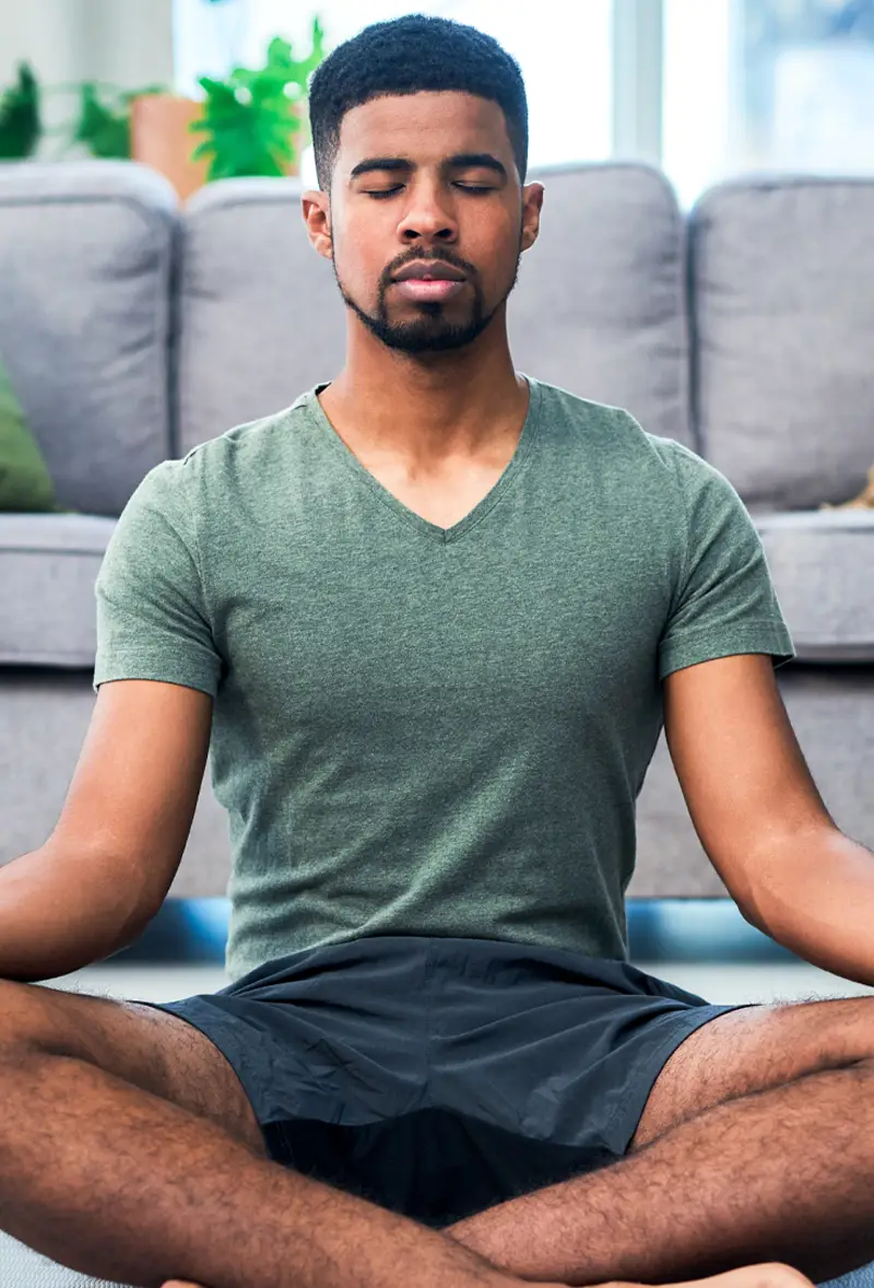 man holding yoga pose