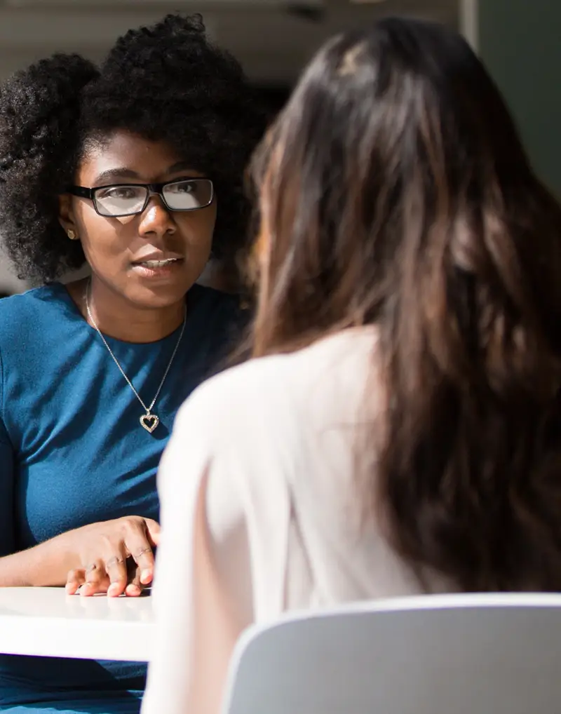 woman and therapist talking