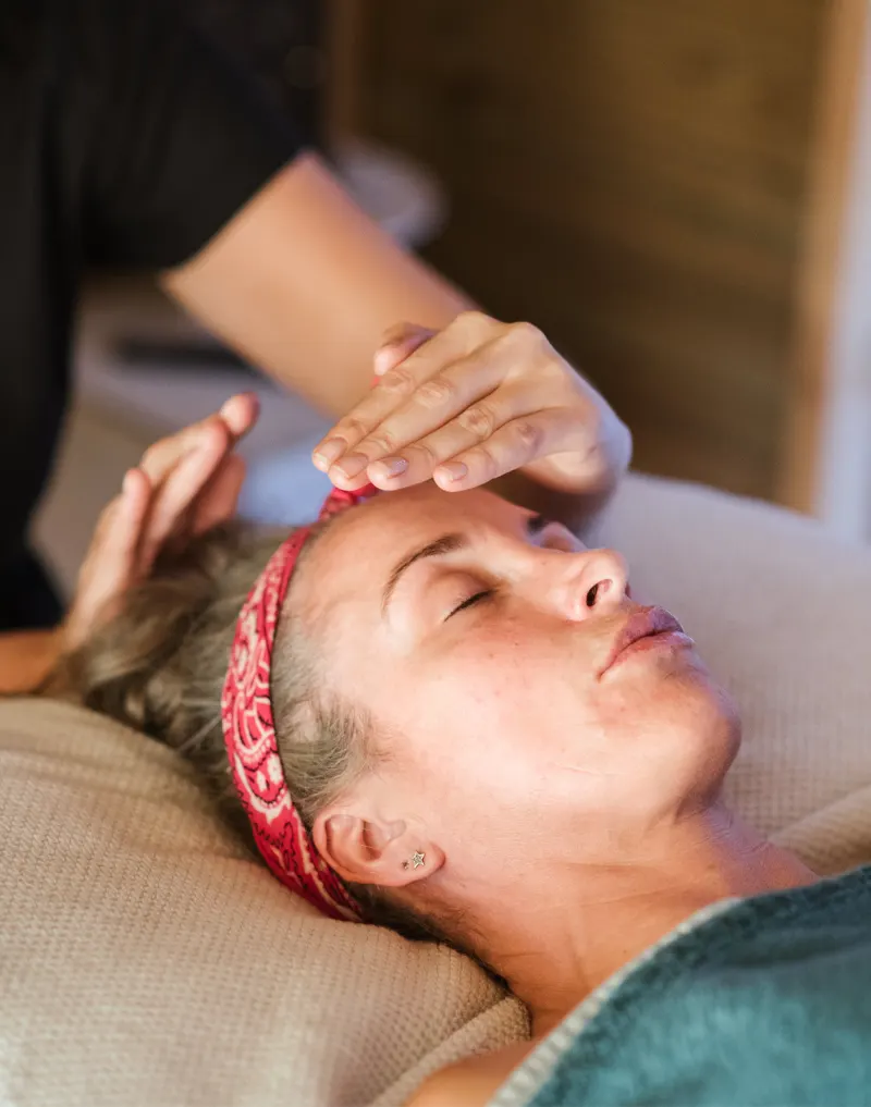 person receiving reiki treatment